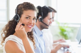 Portrait of confident female call center agent working in office-1